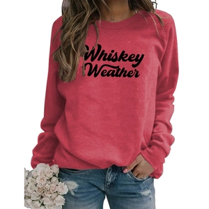 Detail of red Whiskey Weather sweatshirt showing ribbed cuffs and drop shoulder design