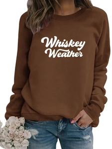 Detailed view of Whiskey Weather graphic print on dark brown crewneck sweatshirt