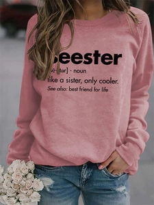 Detail of crewneck sweatshirt in dusty pink with Beester dictionary print and long sleeves