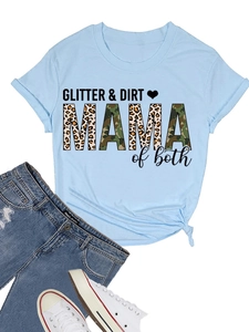 Flat lay of light blue T-shirt with GLITTER DIRT print and leopard camouflage text