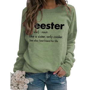 Close-up of crewneck sweatshirt with Seester letter print and definition text detail