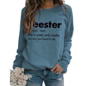 Close-up of Seester definition text print on blue crewneck long sleeve sweatshirt