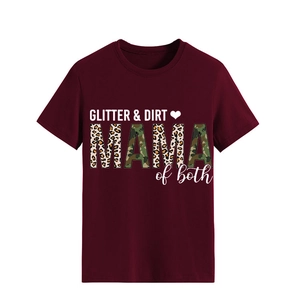 Close-up of GLITTER & DIRT MAMA print with leopard and camo motifs on a maroon cotton T-shirt