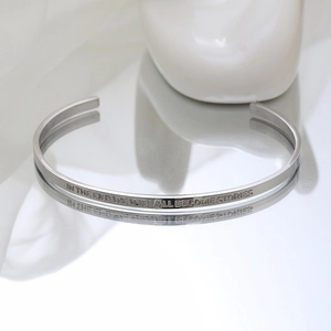 Polished stainless steel C-shaped cuff bracelet engraved with inspirational quote