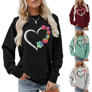 Detail of colorful rainbow paw heart print on casual long-sleeve crewneck sweatshirt