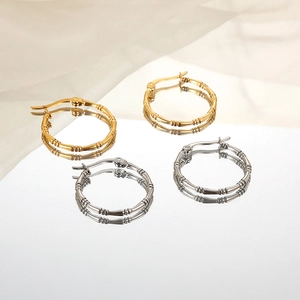 Bamboo style stainless steel hoop earrings set in polished gold and silver finishes