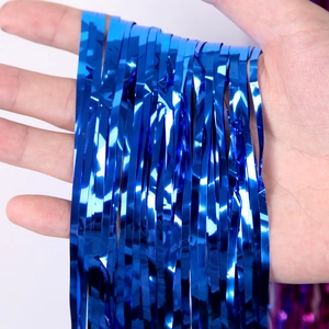 Vibrant light blue metallic foil fringe curtain for party background and wall decoration