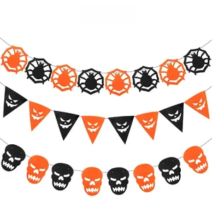 Detail of Halloween triangle banners with spider webs and skull designs in black and orange