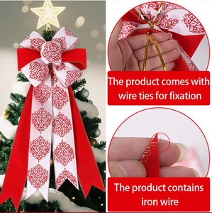 Close-up of red velvet Christmas bow with iron wire edges and golden wire ties
