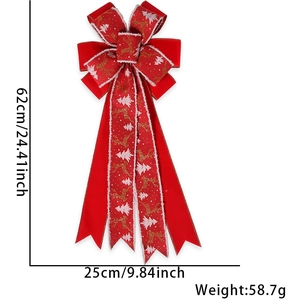 Detail of red Christmas bow featuring golden reindeer and white tree patterns