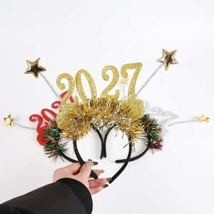 Detail view of sparkly 2021 New Year headbands with tinsel and spring-mounted stars