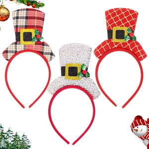 Detailed view of three festive Christmas mini top hat headbands with plaid and sequins