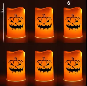 Detailed set of 6 orange Halloween LED candles with classic pumpkin face designs