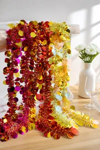Close-up of sparkling colorful Christmas tinsel garland with large round sequins decoration