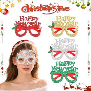 Detail showing colorful glittery Happy New Year eyewear props for festive parties