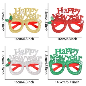 Detail view of colorful glitter Happy New Year glasses in red, gold, silver and green