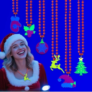 Detail of Christmas beaded necklaces with felt elk and tree pendants for holiday parties