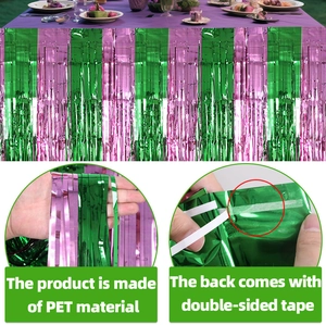 Detail of pink and green fringe curtain with PET material and adhesive tape