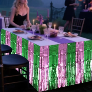 Pink and green metallic foil fringe table skirt for wicked witch party decorations