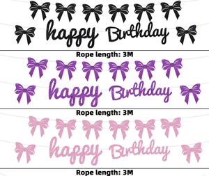 Glitter birthday banner in black, purple, and pink colors with 3M rope and bows