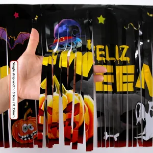 Detail of 0.35 inch wide black foil fringe curtain with Feliz Halloween pumpkin icons