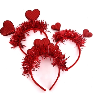 Set of three red tinsel heart headbands for Valentine party favors and photo props
