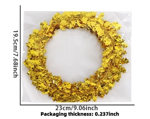 Detailed dimensions of gold holly leaf sequin garland in clear plastic packaging