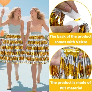Detail view of gold and silver fringe skirt with adjustable Velcro waist closure