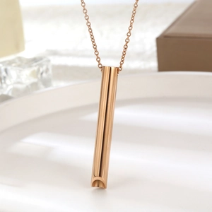 Collar de respiración consciente con colgante de cilindro en oro rosa para el estrés