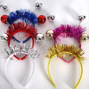 Close-up of disco ball headbands in multiple colors with springs and tinsel decor