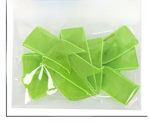 Detailed size specifications for a bright green mesh linen bow in plastic packaging