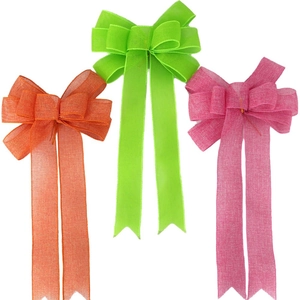 Three large linen-imitation mesh Christmas tree bows in orange, green, and pink colors