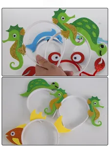 Detailed view of colorful felt ocean animal headbands with sea turtles and dolphins