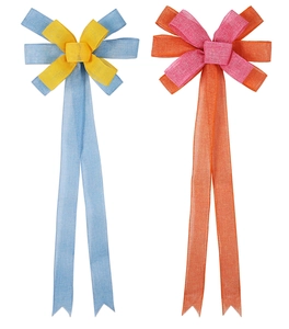 Close-up of vibrant faux linen bows with colorful layers and long swallowtail ribbons