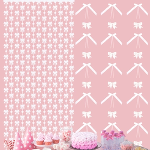 Pink birthday party backdrop featuring laser bowknot and star patterns with party props