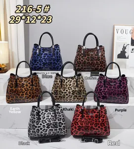 Detailed display of seven leopard print tote bags in various colors with size specifications