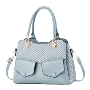 Blue tote bag with chevron weave details and dual front envelope pockets