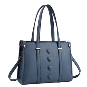 Elegant navy blue crossbody handbag with 3D heart decorations and golden hardware