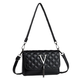 Quilted black crossbody bag with silver V-logo and chain fringe on white background