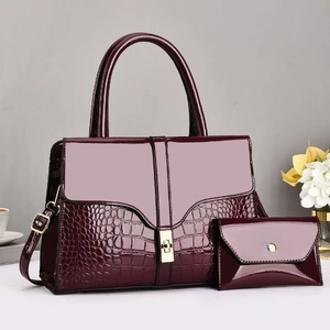 Deep burgundy patent leather tote bag set with crocodile texture and gold hardware
