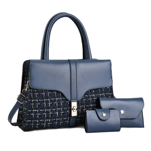 Three-piece set of dark blue tote bag with tweed panels and gold hardware lock