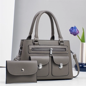 Gray lychee textured handbag set with multi-pocket design and crossbody strap