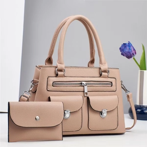 Beige faux leather handbag set with matching clutch and silver hardware detail