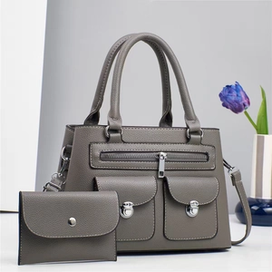 Gray faux leather handbag and wallet set with litchi texture and multiple pockets