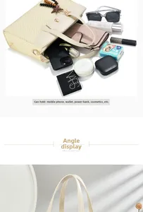 Detailed view of spacious interior of woven handbag with everyday essentials and zipper detail