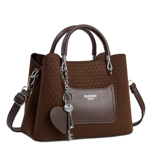 Brown woven texture handbag with silver chain heart charm and dual handles