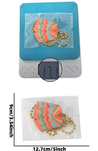 Detail of colorful Mexico party pendant showing 17.1g weight and 12.7cm size dimensions