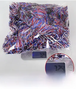 Macro detail of red, white, and blue Independence Day tinsel garland weighing 72.4 grams