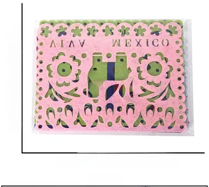 Detail of felt Viva Mexico cutout banner flags with colorful floral cactus patterns