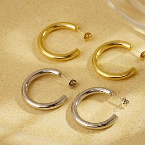 Minimalist C-shaped titanium steel earrings set in gold and silver polished finishes